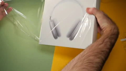 Unboxing hands of the best Apple Computers AirPods Max Stock-Footage 147538121