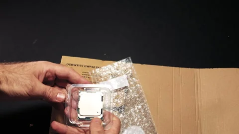 Unboxing Intel Xeon CPU from Amazon Prime Parcel Stock Footage 310525030