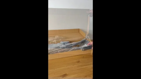 Unboxing a New Pull-Up Bar (Open Box) Stock Footage 311017540