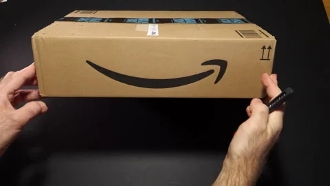 Unboxing NVIDIA Quadro RTX GPU from Amazon Prime Package Stock Footage 303428398