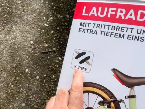 Unboxing a Puky Lr Light Learner Bike: v-Brake Sign Revealed. Stock Photos