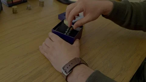Unboxing small box of Bracelet Stock Footage 329710573
