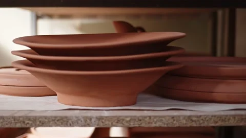 Unbrushed Plates in a Ceramic Workshop Stock Footage 204741947