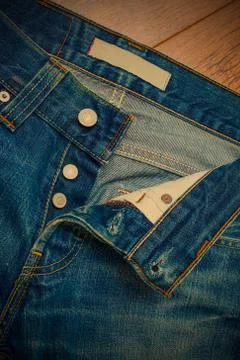 Unbuttoned jeans Stock Photos