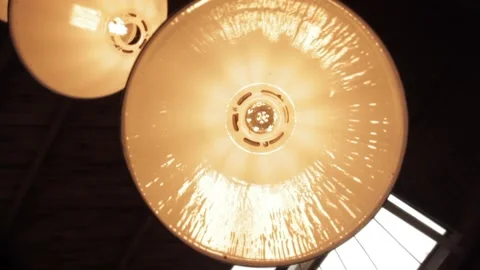 Uncentered rotation under lamp Stock Footage 163338206