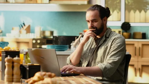 Uncertain person dealing with ambiguous remote job tasks at home Stock Footage 330441876