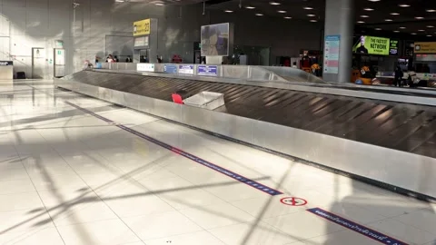 Unclaimed, delayed and lost luggage at Suvarnabhumi International Airport Stock Footage 235416640