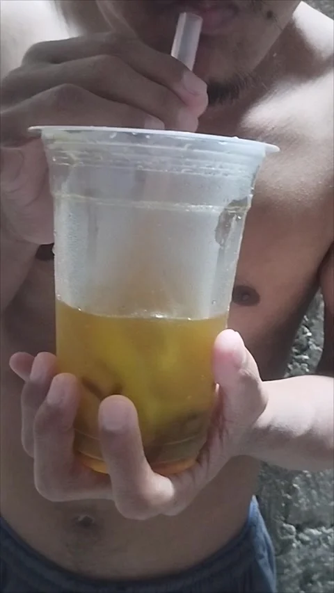 Uncle is drinking grass jelly ice Stock Footage 294876900