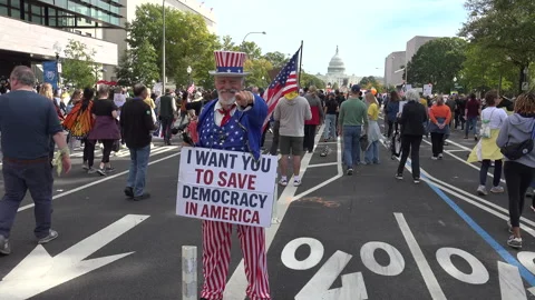 Uncle Sam greets demonstrators, No Kings protest, DC Stock Footage 319408430