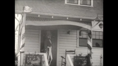Uncle Sam walks out of house 1930 Stock Footage 56162236