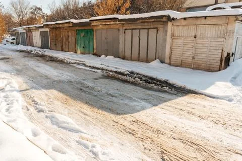 Uncleaned roads after a winter snowfall in Kazakhstan. highway covered with Stock Photos