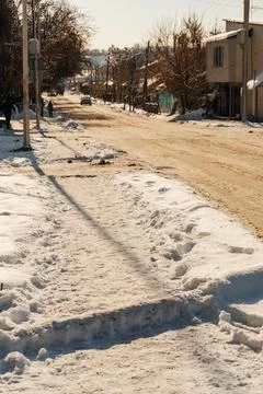 Uncleaned roads after a winter snowfall in Kazakhstan. highway covered with 写真素材