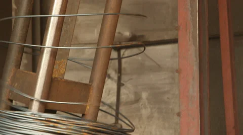Uncoiling Wire Rods Stock Footage 33871307