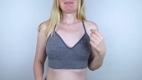 Uncomfortable bra. Bra marks. Non-anatomical underwear causing squeezing and rub Stock Footage 243178028