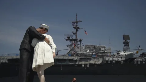 "Unconditional Surrender" sculpture and a military ship Stock Footage 87103358
