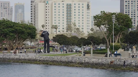 "Unconditional Surrender" sculpture on the waterfront Stock Footage 86792505