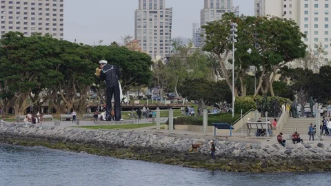 "Unconditional Surrender" statue on the waterfront Stock Footage 86792868
