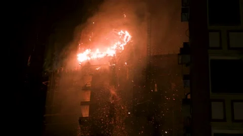 An uncontrollable fire breaks out in an high-rise skyscraper office Stock Footage 237049504