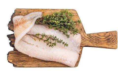 Uncooked Atlantic cod fillet, raw fish ready to be seasoned and transformed.. Stock Photos