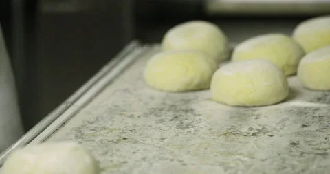 Uncooked Bread Dough Mould Into Silver Bowl And Place On Long Metal Pan Video stock 142084953