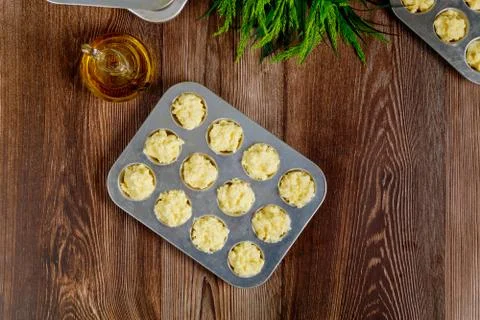 Uncooked cheese bread called chipa in baking tray. Stock Photos