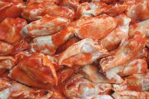 Uncooked chicken wings Stock Photos