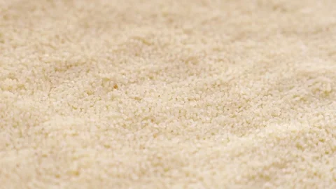 Uncooked couscous grains circle rotation close up Stock Footage 264097701