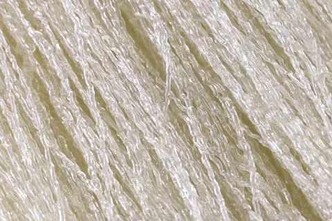Uncooked dry transparent white arrowroot noodles close up Stock Photos