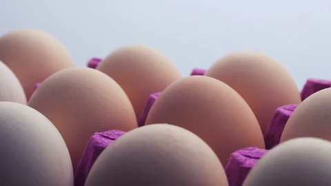 Uncooked eggs. Rotating and closeup. Nobody Stock Footage 97937392
