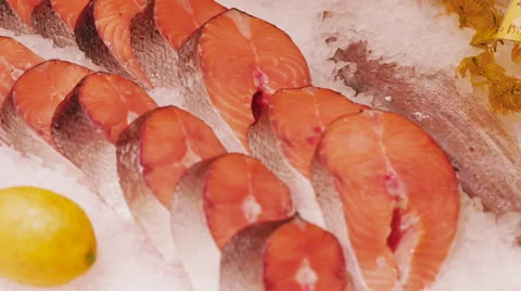 Uncooked fresh red tuna fish pieces served over ice Stock Footage 58479345