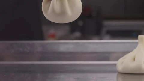 Uncooked khinkali dumplings lying on the table close-up. Stock Footage 314971441