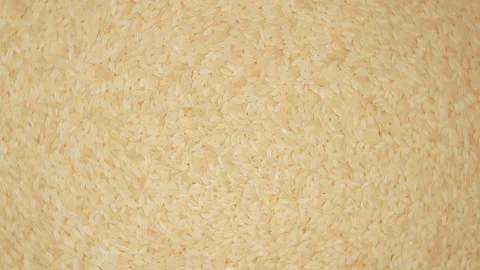 Uncooked Long Grain Parboiled Rice, Rotating Background - Top View Stock Footage 172454860