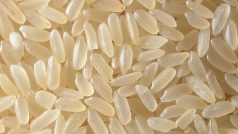 Uncooked Long Grain Parboiled Rice, Rotating Background - Top View 스톡 동영상 183464600
