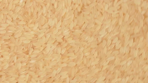 Uncooked Long Grain Parboiled Rice, Rotating Background - Top View Stock Footage 202139984