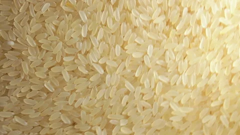 Uncooked Long Grain Parboiled Rice, Rotating Background - Top View Stock Footage 202166222