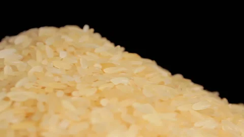 Uncooked Long Grain Parboiled Rice Rotating 스톡 동영상 203832579