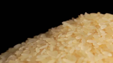 Uncooked Long Grain Parboiled Rice Rotating Stock Footage 217397068