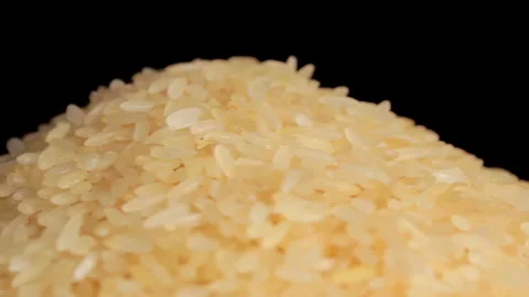 Uncooked Long Grain Parboiled Rice Rotating Stock Footage 243131604