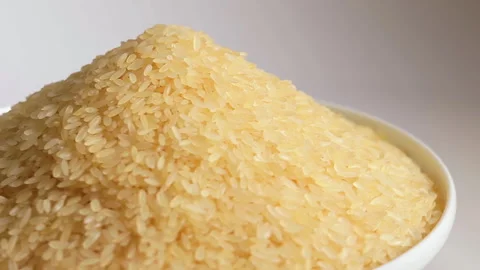 Uncooked Long Grain Parboiled Rice Rotating Stock Footage 245222152