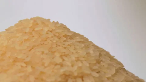 Uncooked Long Grain Parboiled Rice Rotating Stock Footage 246378484