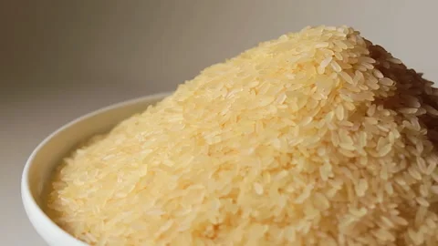 Uncooked Long Grain Parboiled Rice Rotating 스톡 동영상 251007157