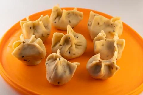 Uncooked momos Stock Photos