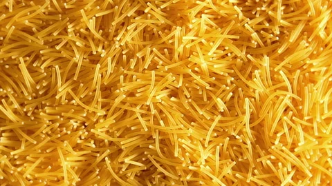 Uncooked Noodles that Slowly Rotating Counterclockwise Stock Footage 253437249