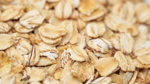 Uncooked oatmeal flakes texture close up Stock Footage 234993451