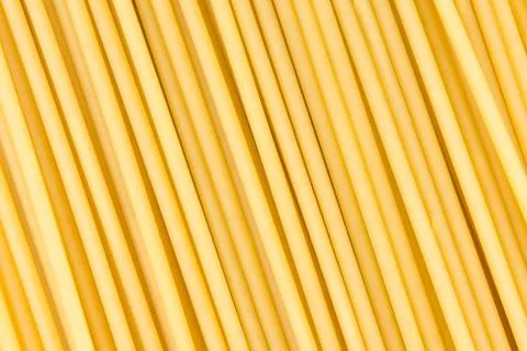 Uncooked pasta background Stock Photos