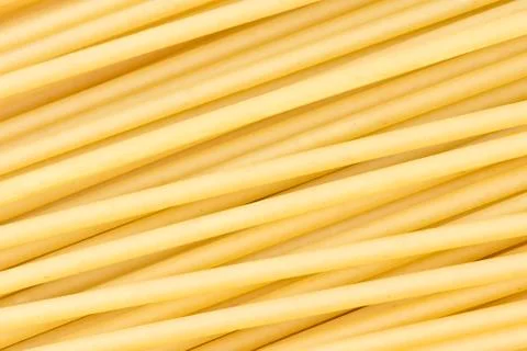 Uncooked pasta background Stock Photos