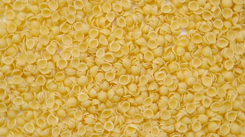 Uncooked pasta as background_pasta shells Stock Footage 36476206