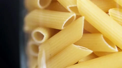 Uncooked Pasta. Dry Macaroni, Moving Background. Italian Culture and Cuisine Stock-Footage 195843586