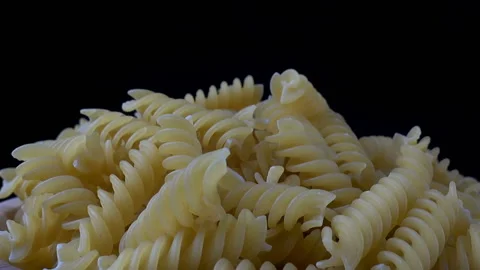 Uncooked pasta on a plate Stock Footage 155238353