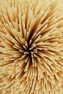 Uncooked pasta spaghetti macaron Stock Photos